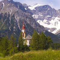 Buy canvas prints of Alpine Church by Peter Jordan