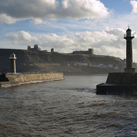 Buy canvas prints of Whitby Harbour Entrance by Peter Jordan