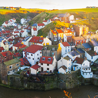 Buy canvas prints of  Staithes Fishing Village Evening by Peter Jordan