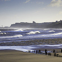 Buy canvas prints of Rough sea in Winter Sunshine at Sandsend near Whit by Peter Jordan