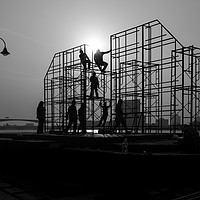 Buy canvas prints of Black and white Scaffolding erectors by David Hitchens