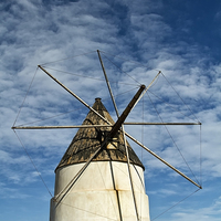 Buy canvas prints of The Graceful Spanish Windmill by Robert Murray