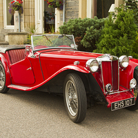 Buy canvas prints of  Red Roadster by Robert Murray