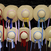 Buy canvas prints of  Straw Hats and Ribbons by Robert Murray