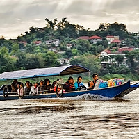 Buy canvas prints of Crossing the Mighty Mekong by Robert Murray