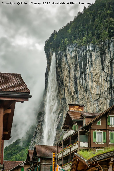 Lauterbrunnen town with waterfall backdrop Picture Board by Robert Murray