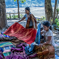 Buy canvas prints of Preparing cloth for market, Laos. by Robert Murray