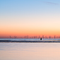 Buy canvas prints of Iron Man watches the spinning wind turbines by Jason Wells