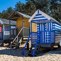 Buy canvas prints of Colourful beach huts at Wells next the Sea by Jason Wells