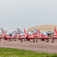 Buy canvas prints of The Red Arrows hug a taxiway in front of four Typhoon's by Jason Wells