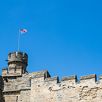 Buy canvas prints of Union Jack above Lincoln castle by Jason Wells