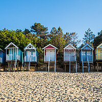 Buy canvas prints of Wells next the Sea beach huts panorama by Jason Wells