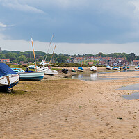 Buy canvas prints of Boats at low tide by Blakeney Quay by Jason Wells