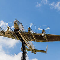 Buy canvas prints of Lancaster bomber statue by Jason Wells