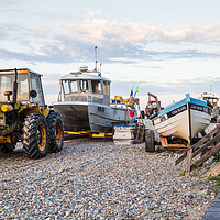 Buy canvas prints of Tractors and fishing boats on Cromer beach by Jason Wells