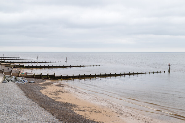 Groynes at Sheringham beach Picture Board by Jason Wells