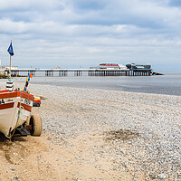 Buy canvas prints of Tractors line the edge of Cromer beach by Jason Wells