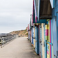 Buy canvas prints of Beach huts on the promenade at Sheringham by Jason Wells