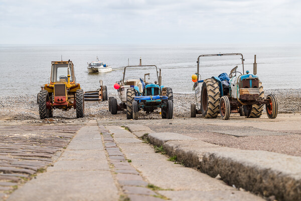 Tractors on Cromer slipway Picture Board by Jason Wells