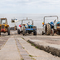 Buy canvas prints of Tractors on Cromer slipway by Jason Wells