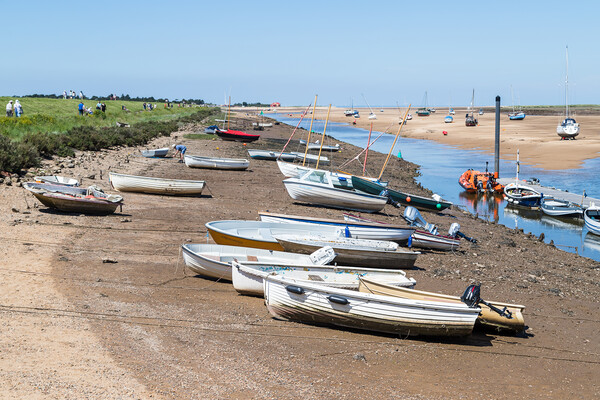 Boats on the channel into Wells next the Sea quay Picture Board by Jason Wells