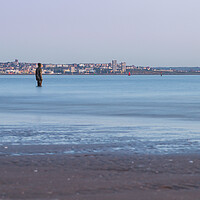 Buy canvas prints of High tide surrounds an Iron Man by Jason Wells