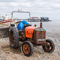 Buy canvas prints of Old tractor on Cromer beach by Jason Wells