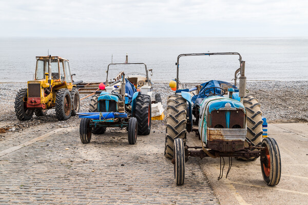 Tractors on the slipway at Cromer Picture Board by Jason Wells