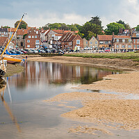 Buy canvas prints of Reflections of Blakeney Quay by Jason Wells