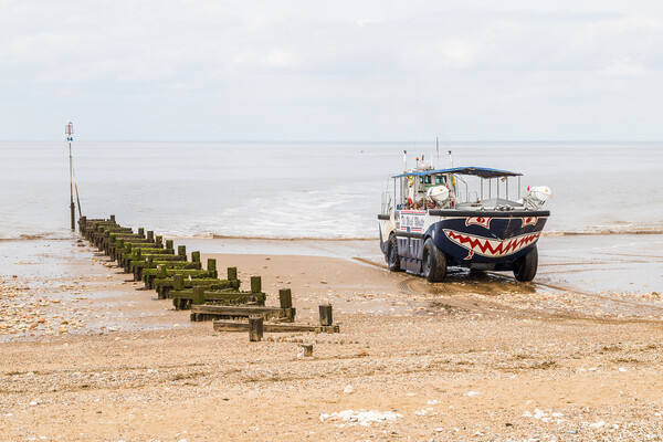 Wash Monster returning to Hunstanton beach Picture Board by Jason Wells