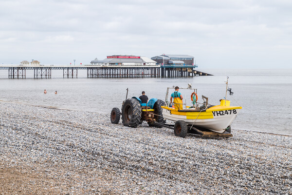 Fishing boat being recovered at Cromer Picture Board by Jason Wells