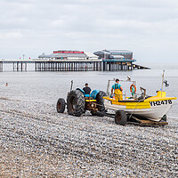 Buy canvas prints of Fishing boat being recovered at Cromer by Jason Wells