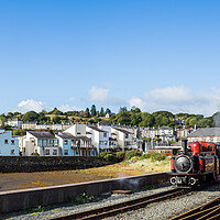 Buy canvas prints of Double Fairlie stream train at Porthmadog by Jason Wells