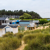 Buy canvas prints of Hunstanton beach huts panorama by Jason Wells