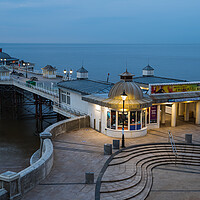 Buy canvas prints of Day turns to night at Cromer pier by Jason Wells