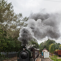 Buy canvas prints of Steam train approaching a platform by Jason Wells