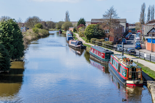 Narrow boats lined up at Burscough Picture Board by Jason Wells