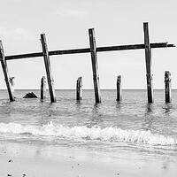 Buy canvas prints of Happisburgh revetments in the sea by Jason Wells