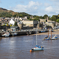 Buy canvas prints of Conwy harbour at low tide by Jason Wells