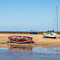 Buy canvas prints of Fishing boats beached at Wells next the Sea by Jason Wells