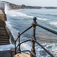 Buy canvas prints of Waves crash into the steps and promenade by Jason Wells