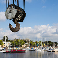 Buy canvas prints of Gigantic hooks from the boat crane at Preston Marina by Jason Wells