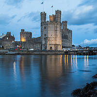 Buy canvas prints of Caernarfon Castle at twilight by Jason Wells
