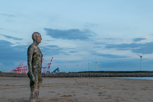 Iron Man stood next to Seaforth Docks Picture Board by Jason Wells