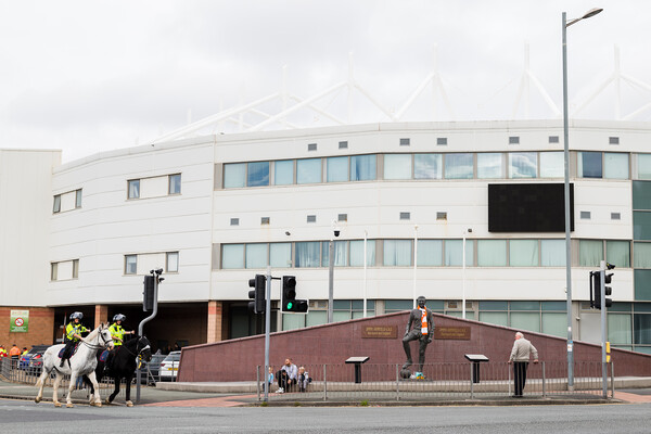 Police on horseback outside Bloomfield Road stadium Picture Board by Jason Wells