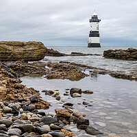 Buy canvas prints of Pools of water by Penmon Lighthouse by Jason Wells
