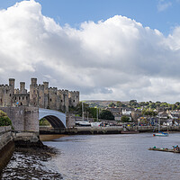 Buy canvas prints of Conwy Castle and harbour panorama by Jason Wells