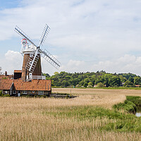 Buy canvas prints of Cley Windmill behind the wetlands by Jason Wells