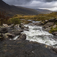 Buy canvas prints of Water running off the Glyderau mountains by Jason Wells