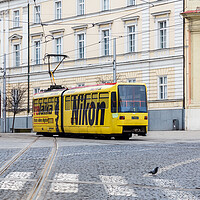 Buy canvas prints of Nikon advertising on a tram by Jason Wells